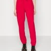 Jordan PANT CORE - Pantalones Deportivos - Gym Red, Mujer