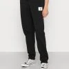 Jordan PANT - Pantalones Deportivos - Black/sail , Mujer